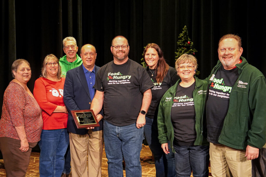 JR Bonham is presented the 2023 Stephen W. Zelkowitz Award during the Food For The Hungry broadcast.