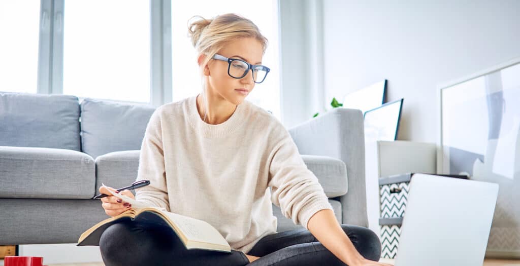 Adult student budgeting for online MBA degree costs