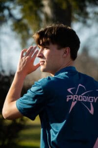 A student playing disc golf at MVNU
