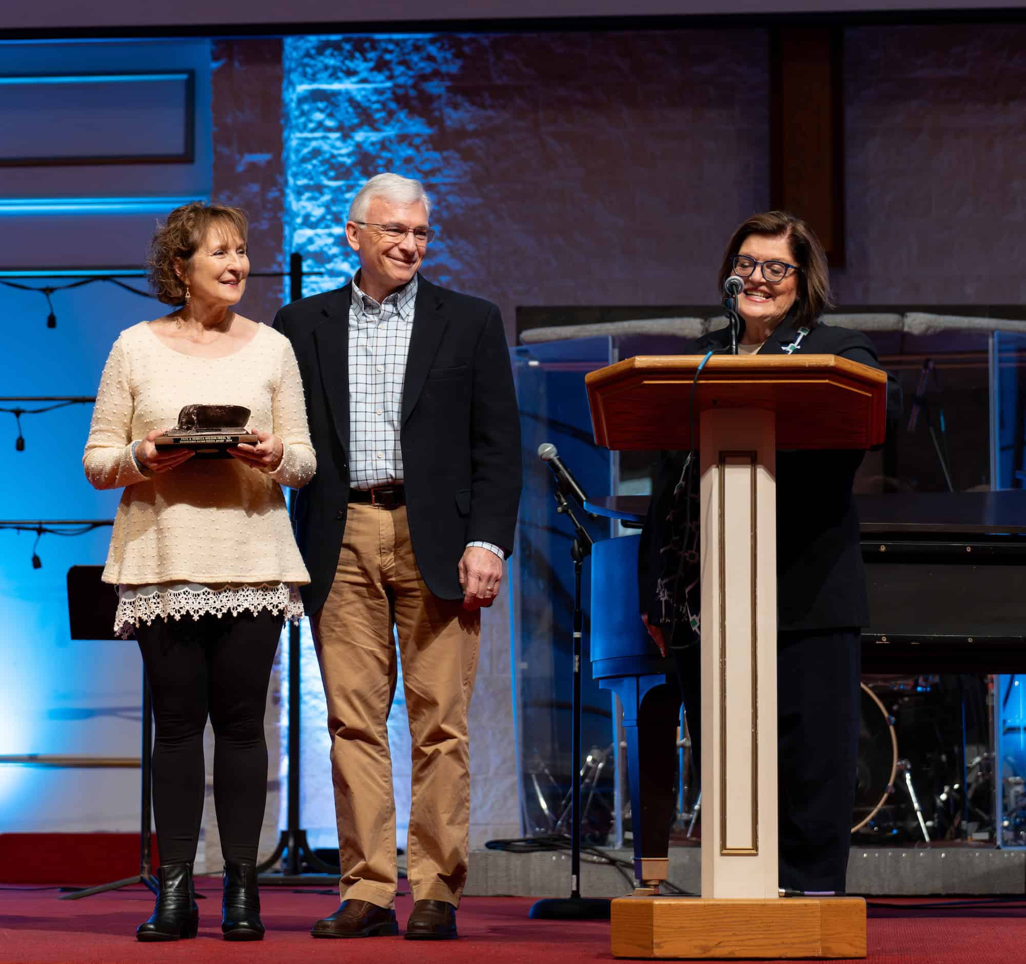 Dr. Paul and Becky Freel, left, received the Distinguished Alumni Service Award from Dr. Cynthia Sizemore, MVNU Executive Director of Alumni Relations and President's Circle.