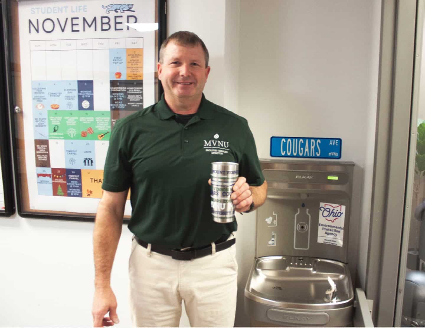 MVNU Director of Facilities, Ben Cook, stands in front of a newly installed water bottle fill station in Hyson Campus Center made possible by the 2024 Ohio EPA Recycling and Litter Prevention grant. (Photo courtesy of Mount Vernon Nazarene University)