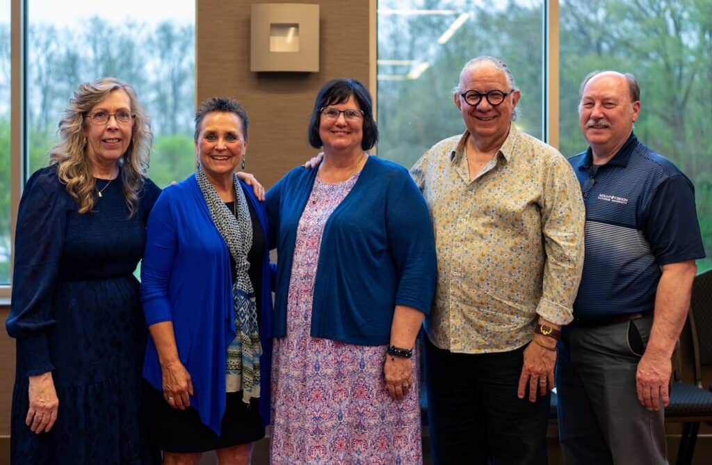 Mount Vernon Nazarene University celebrated the retirements of seven distinguished faculty and staff members recently. Pictured, from left with years of service, are: Colleen Bryan (36), Yvonne Schultz (24), Wendi Lahmon (30), John Donnelly (36) and Paul Madtes Jr. (36). Not pictured is Jeanna Howald (36) and Thomas McCoy (11). (Photo courtesy of Mount Vernon Nazarene University)