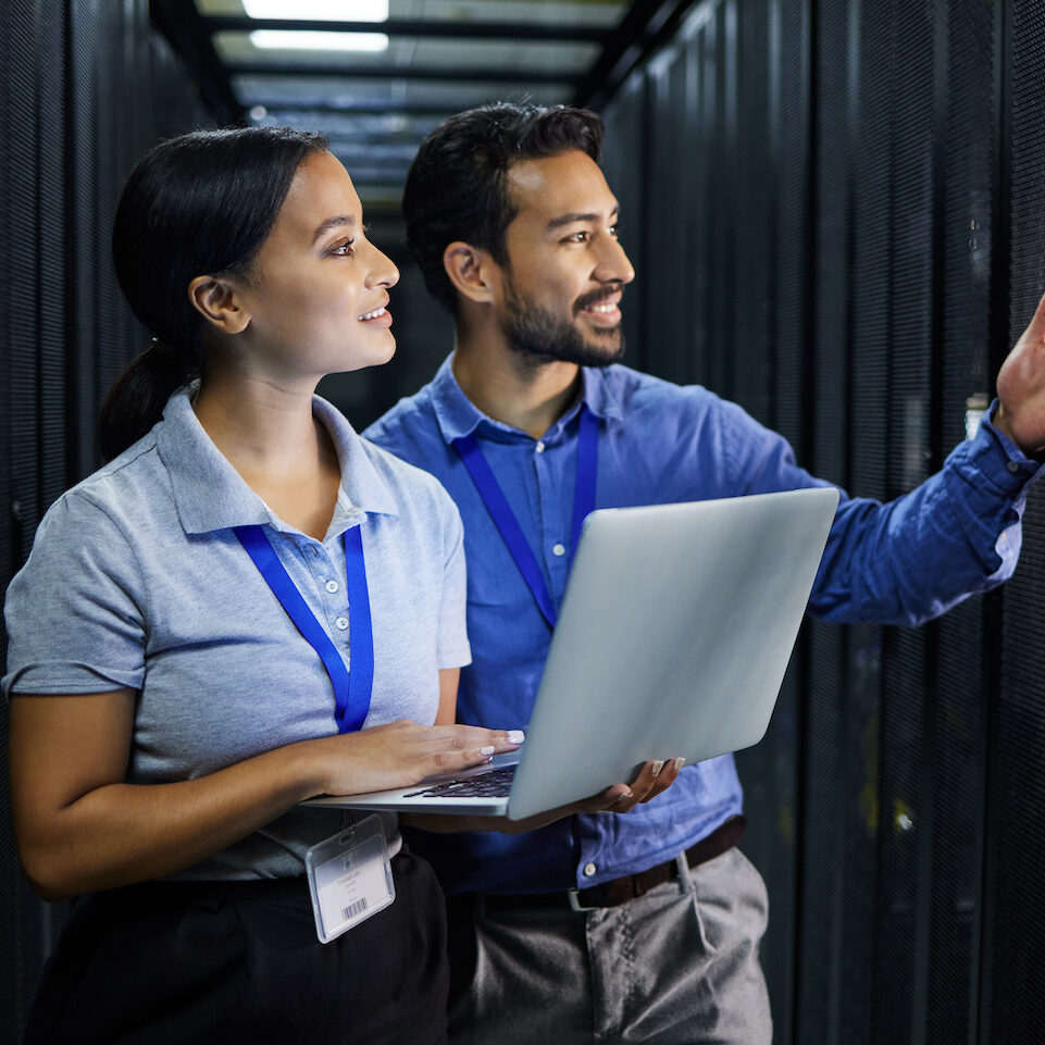 Server room, laptop and manager people or technician in data center management, system and cyber se.